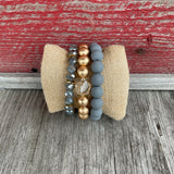 Three strand Gold and Colorful stretch bracelet